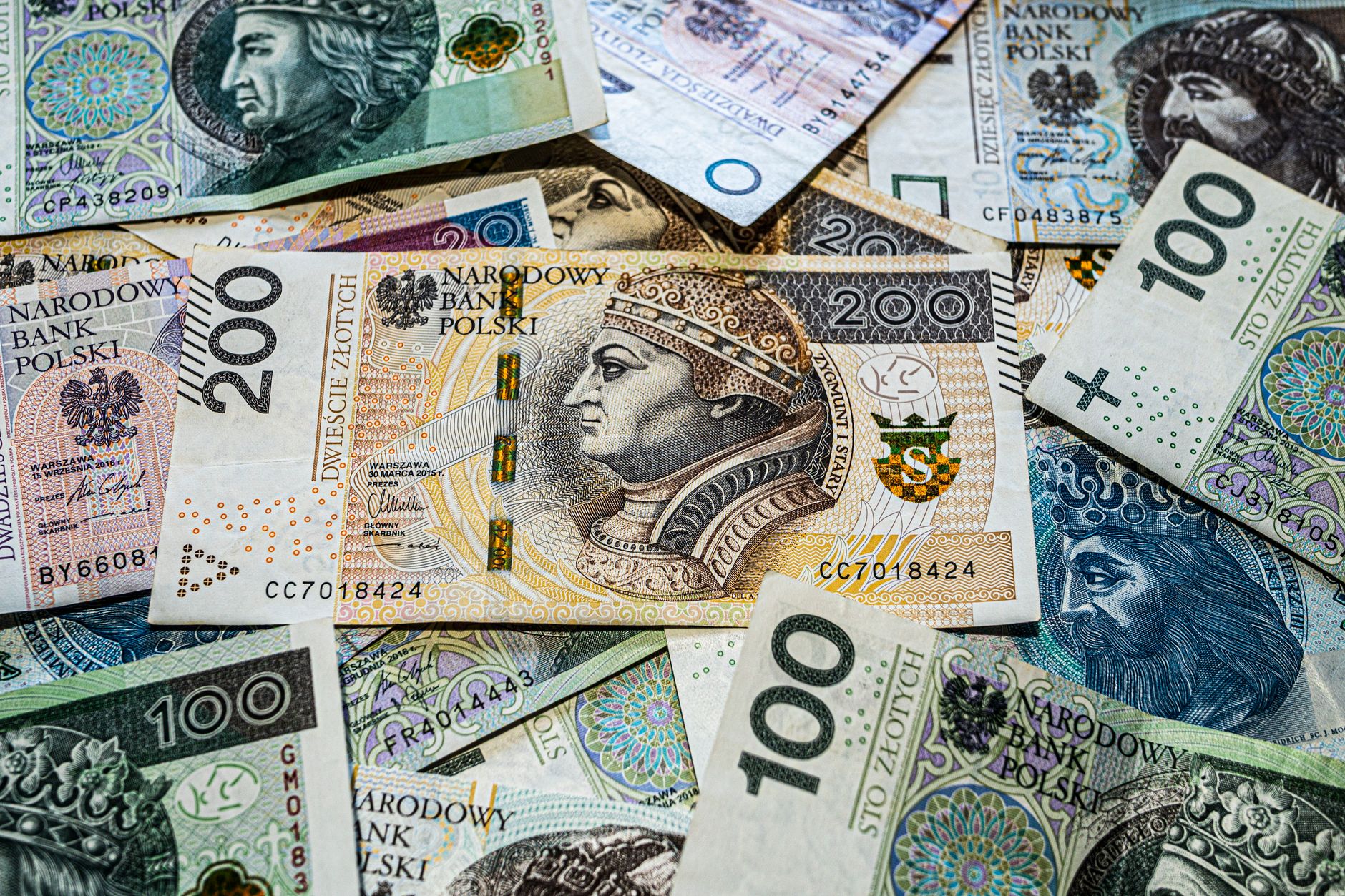 Colorful Polish Zloty banknotes from Narodowy Bank Polski in vibrant composition.